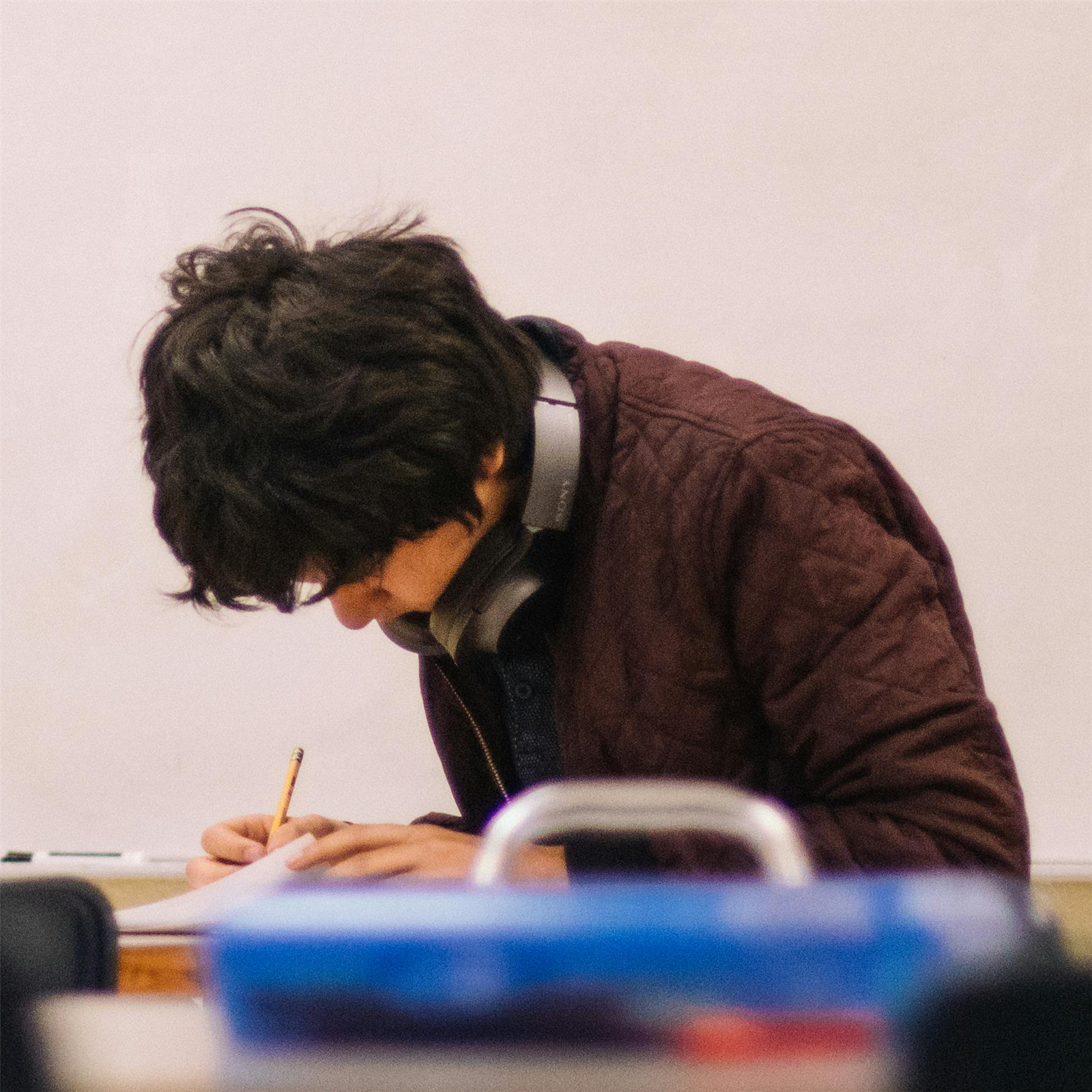  A student studying at a desk